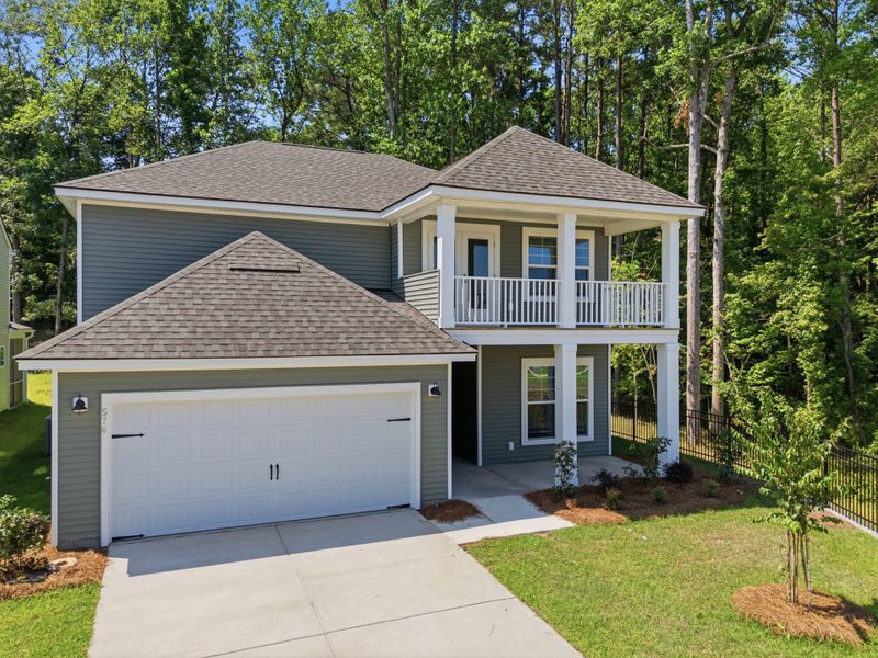Front exterior of a new home in Grand Arbor, Blythewood, SC, highlighting curb appeal (Image 20). Front exterior of a new home in Grand Arbor, Blythewood, SC, highlighting curb appeal (Image 20).