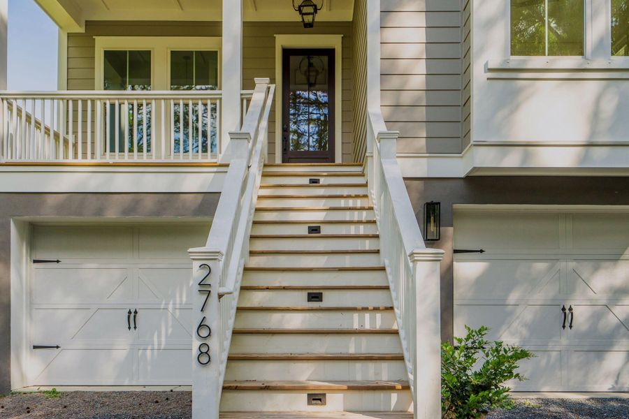 Exterior details and patio area of a home in , Johns Island (Image 33).