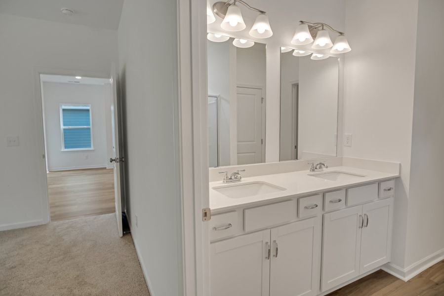 Furnished interior view inside a new home in Marlin Pointe, White House (Image 7).