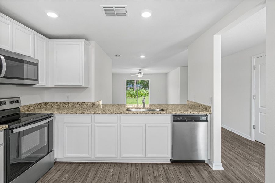 Furnished interior view inside a new home in Vero Lake Estates, Vero Beach (Image 6).