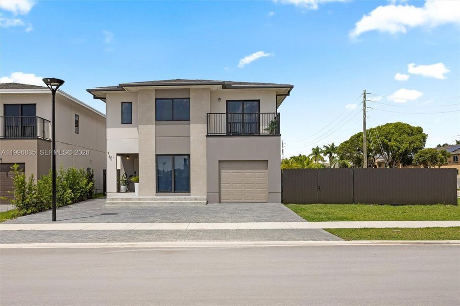 Front exterior of a new home in , Florida City, FL, highlighting curb appeal (Image 21).