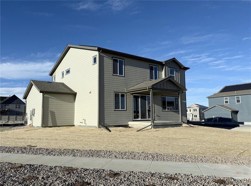 Exterior details and patio area of a home in The Reserve at Looking Glass, Parker (Image 2). Exterior details and patio area of a home in The Reserve at Looking Glass, Parker (Image 2).