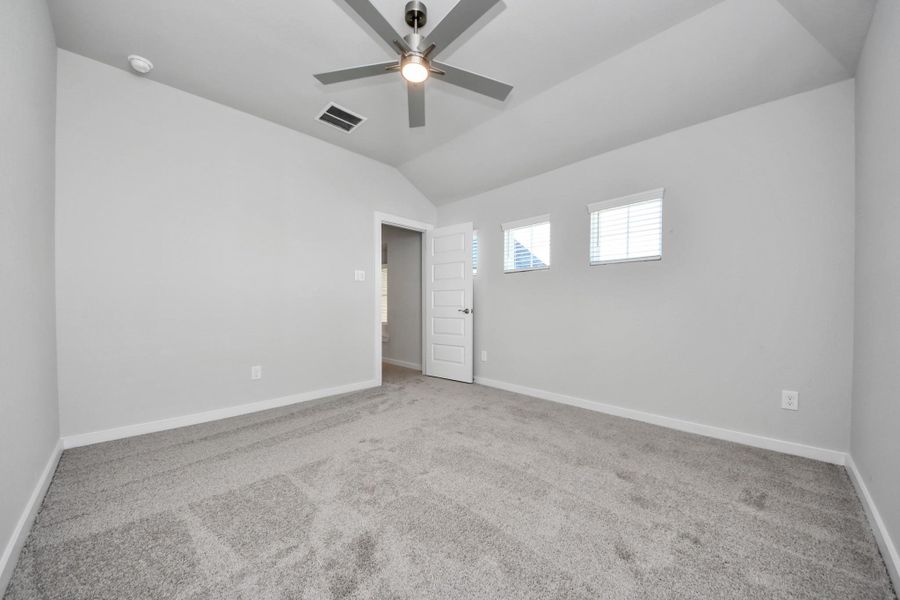 Generously sized secondary bedrooms featuring spacious closets, soft and inviting carpeting underfoot, large windows allowing plenty of natural light, and the added touch of privacy blinds for your personal retreat. Sample photo of completed home with similar floor plan. Actual colors and selections may vary. Generously sized secondary bedrooms featuring spacious closets, soft and inviting carpeting underfoot, large windows allowing plenty of natural light, and the added touch of privacy blinds for your personal retreat. Sample photo of completed home with similar floor plan. Actual colors and selections may vary.