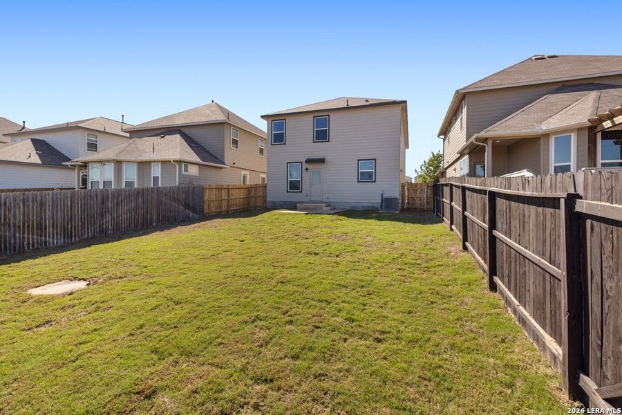Exterior details and patio area of a home in Knox Ridge, Converse (Image 23).