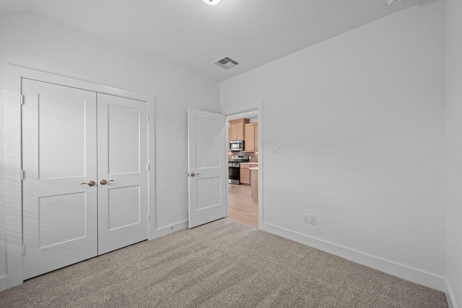Spacious, unfurnished interior of a new home in Meridiana, Iowa Colony (Image 12).