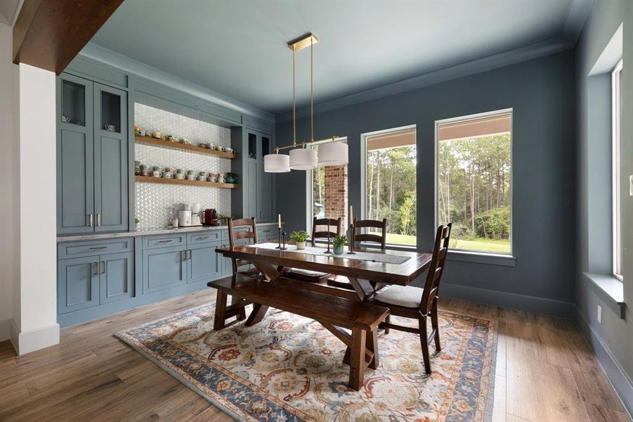 Breakfast nook with coffee bar overlooking the backyard.