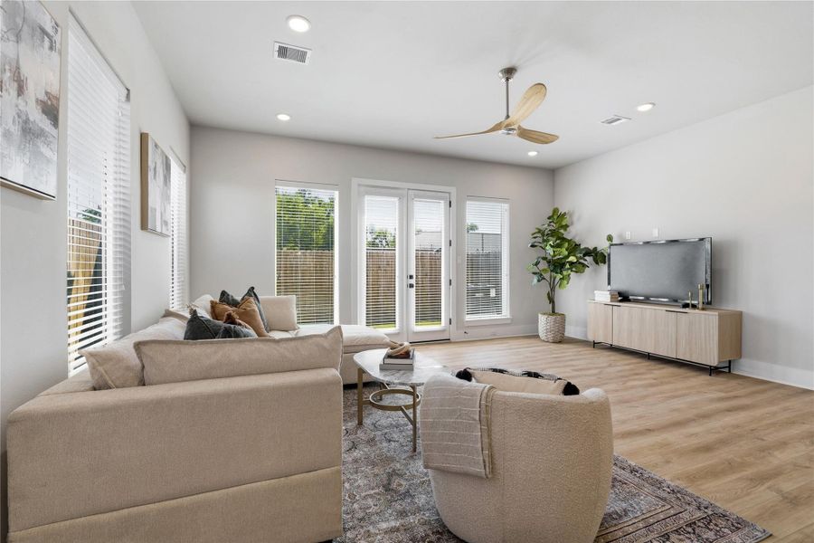 Designed for both comfort and scale, the living room offers generous space for full seating arrangements while maintaining an open, airy feel. Designed for both comfort and scale, the living room offers generous space for full seating arrangements while maintaining an open, airy feel.