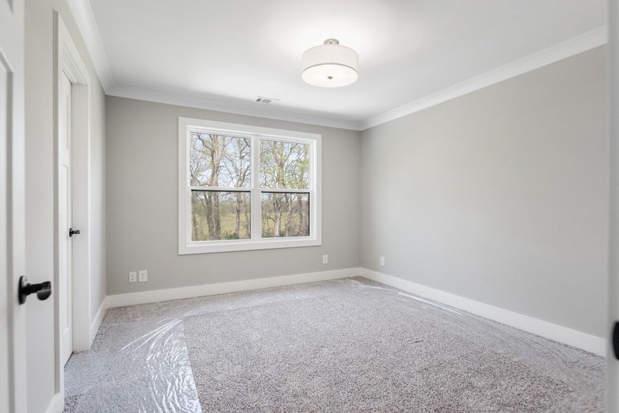 Spacious, unfurnished interior of a new home in Whisper Hill, Wendell (Image 52).