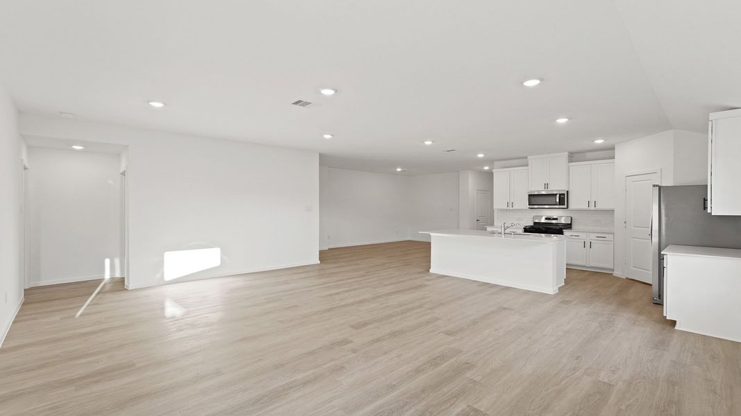 Representative unfurnished interior of a home built from the Lakeway by D.R. Horton in New Waverly Station, New Waverly (Image 13).