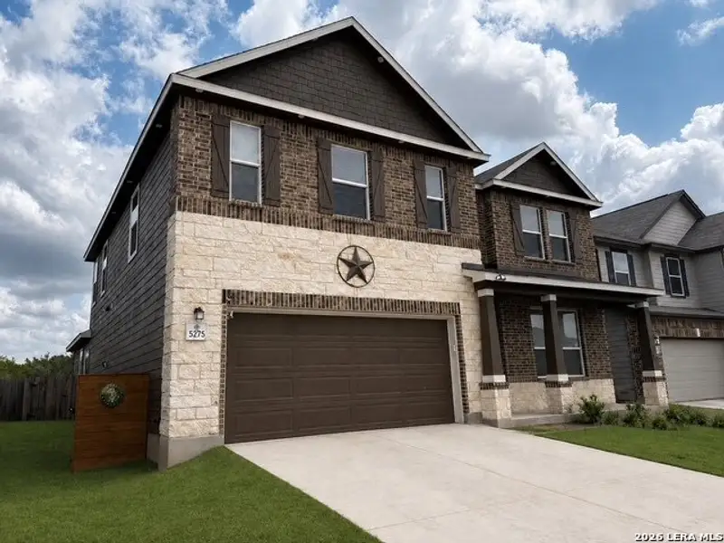 Front exterior of a new home in Canyon Crest, San Antonio, TX, highlighting curb appeal (Image 23). Front exterior of a new home in Canyon Crest, San Antonio, TX, highlighting curb appeal (Image 23).
