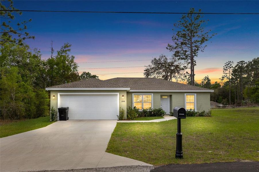 Front exterior of a new home in , Dunnellon, FL, highlighting curb appeal (Image 21).