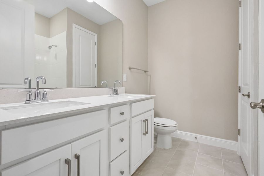 Furnished interior view inside a new home in Legends Preserve - Signature Series, Daytona Beach (Image 6).