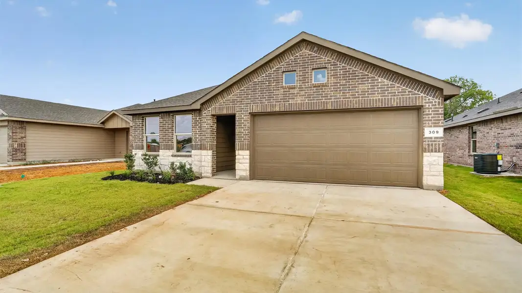 Representative exterior photo of a completed home built from the Carson by D.R. Horton in Monarch at the Meadows, Denton, TX (Image 2).