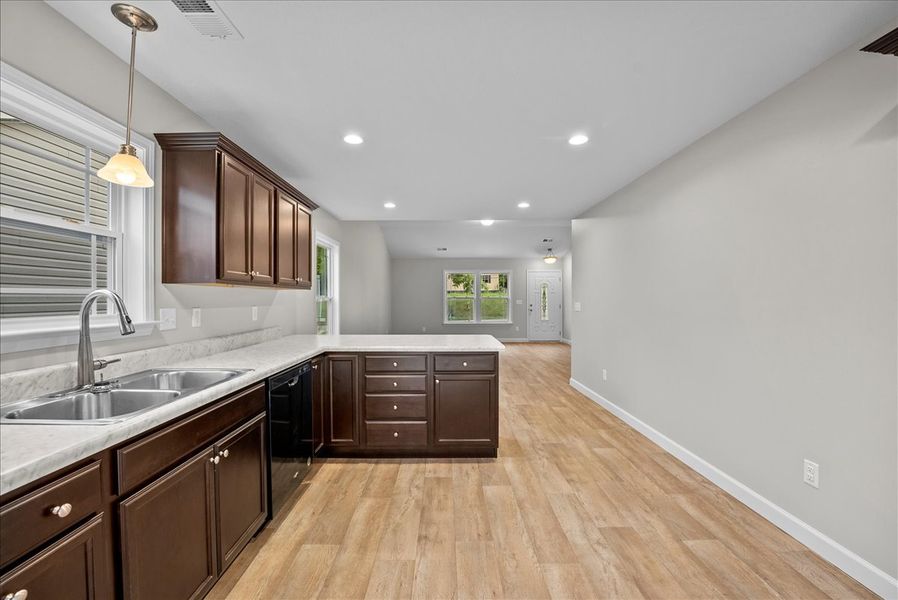 Representative furnished interior of a home built from the Lyman by Enchanted Homes in Lonesome Dove, San Antonio (Image 10).