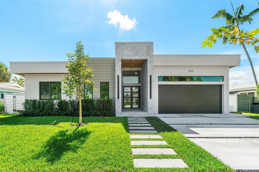 Front exterior of a new home in , Pompano Beach, FL, highlighting curb appeal (Image 21).