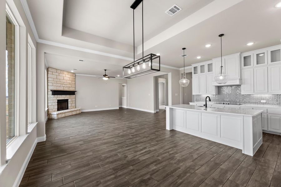 Nook to Family Room | Concept 2623 at The Meadows in Gunter, TX by Landsea Homes