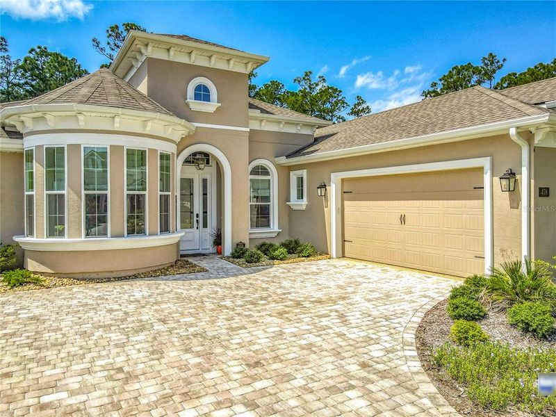Exterior details and patio area of a home in , Ormond Beach (Image 25).