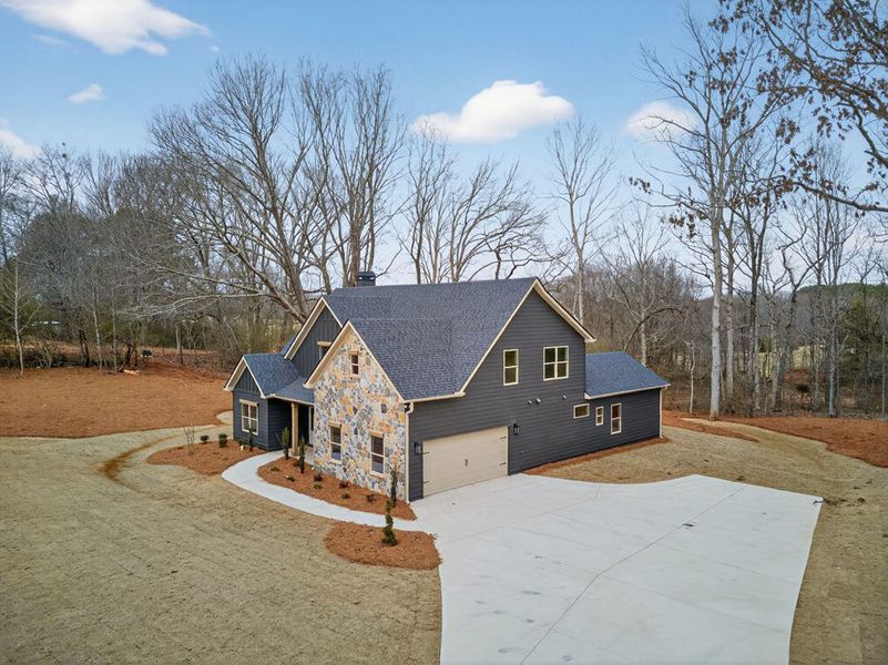 Front exterior of a new home in Blackwelder Bluff, Bowdon, GA, highlighting curb appeal (Image 26).