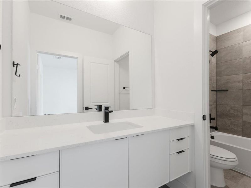 Furnished interior view inside a new home in Royal Court, Little Elm (Image 9).