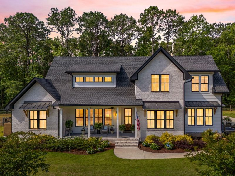 Front exterior of a new home in , Johns Island, SC, highlighting curb appeal (Image 2). Front exterior of a new home in , Johns Island, SC, highlighting curb appeal (Image 2).