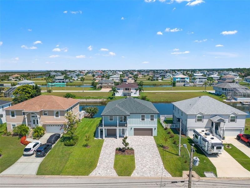 Front exterior of a new home in , Hernando Beach, FL, highlighting curb appeal (Image 2). Front exterior of a new home in , Hernando Beach, FL, highlighting curb appeal (Image 2).