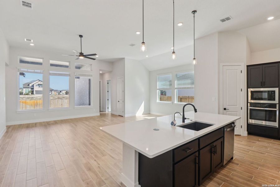 Furnished interior view inside a new home in Village at Three Oaks, Seguin (Image 5).