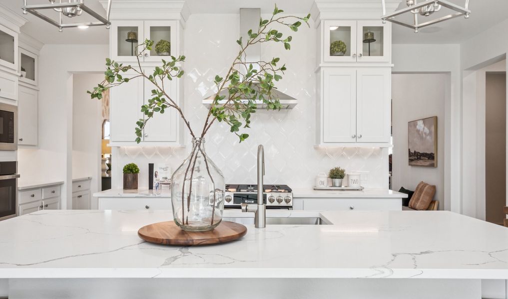 Kitchen with full-height tile backsplash Kitchen with full-height tile backsplash