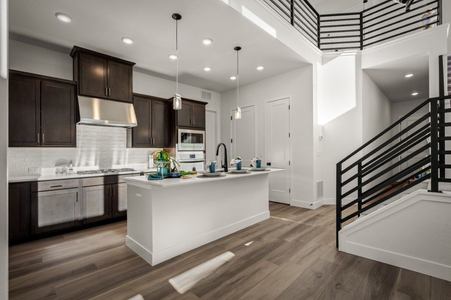 Furnished interior view inside a new home in Revel Crossing at Wolf Ranch - The Panorama Collection, Colorado Springs (Image 8).
