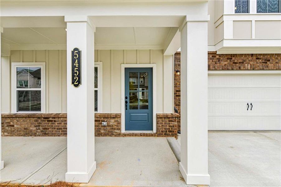 Exterior details and patio area of a home in Eastlyn Crossing, Flowery Branch (Image 3).