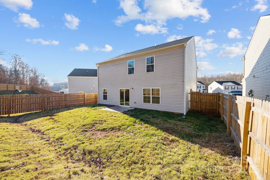 Exterior details and patio area of a home in , Mocksville (Image 3).