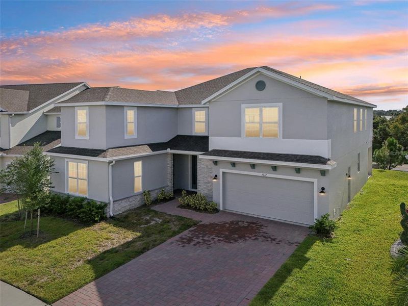 Front exterior of a new home in , Groveland, FL, highlighting curb appeal (Image 19). Front exterior of a new home in , Groveland, FL, highlighting curb appeal (Image 19).