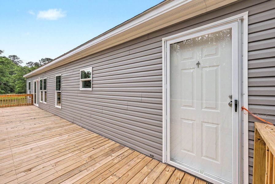 Exterior details and patio area of a home in , Ridgeville (Image 24).
