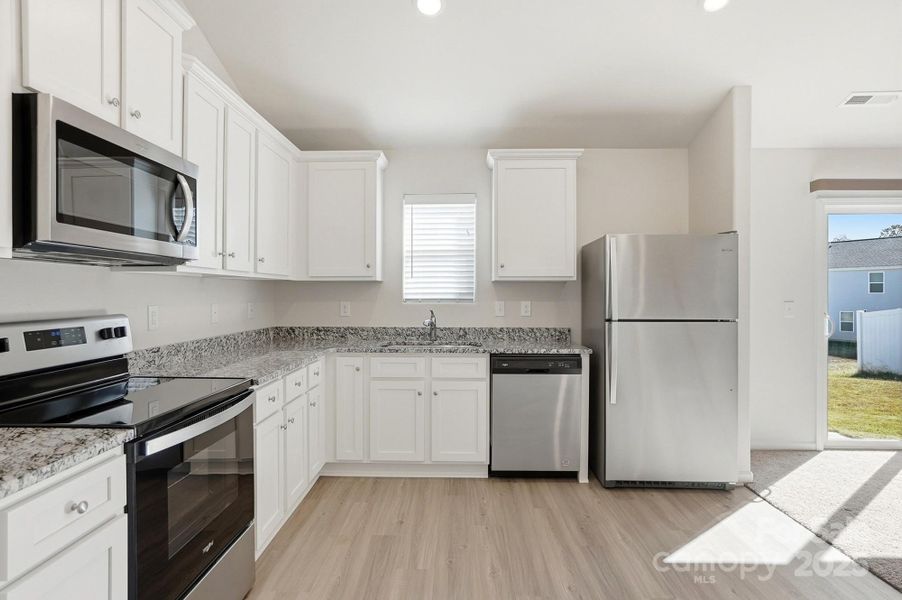 Furnished interior view inside a new home in Knights Bridge, Richburg (Image 11).