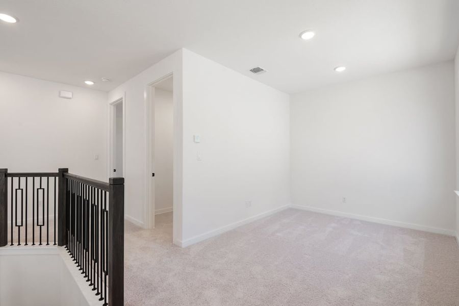 Spacious, unfurnished interior of a new home in Terrace Collection at Lariat, Liberty Hill (Image 26).