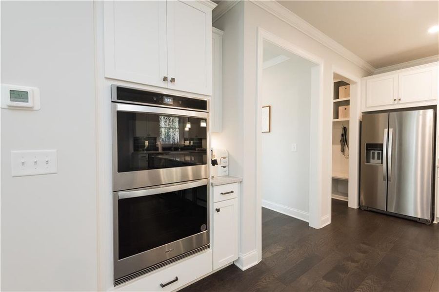 Furnished interior view inside a new home in The Estates at Hurricane Pointe, Douglasville (Image 18).