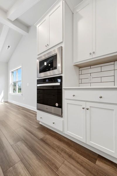 Furnished interior view inside a new home in Weybridge, Burlington (Image 11).