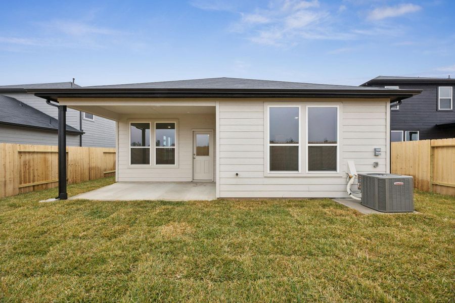 Exterior details and patio area of a home in Montgomery Bend, Montgomery (Image 3).
