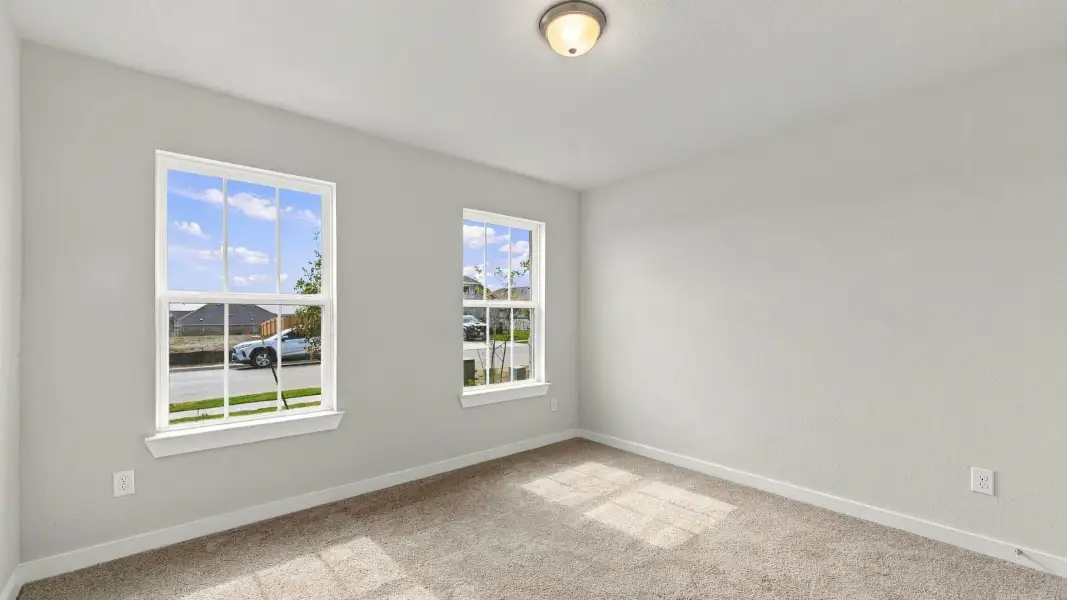 Furnished interior view inside a new home in Carillon, Manor (Image 15).