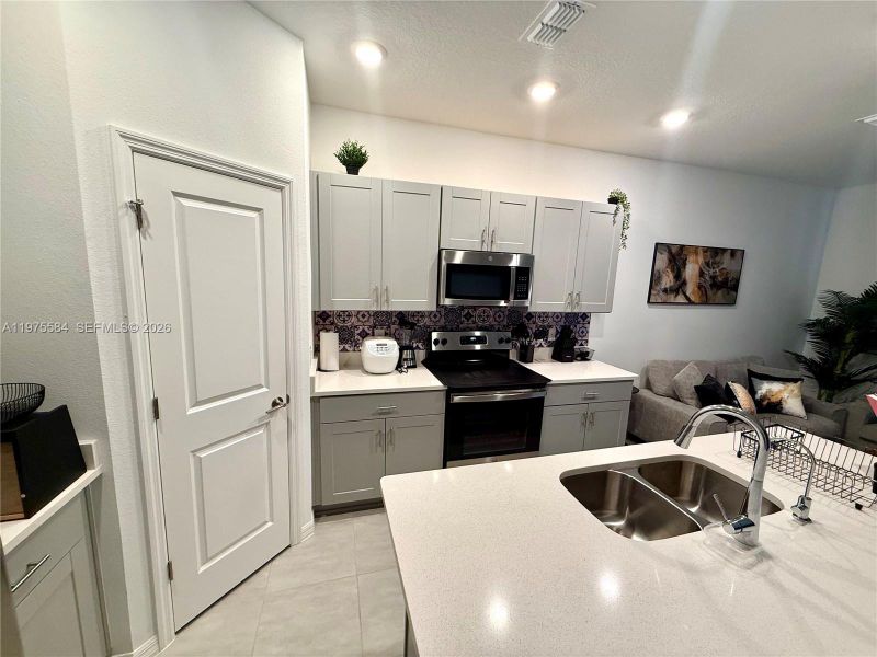 Furnished interior view inside a new home in , Kissimmee (Image 8).