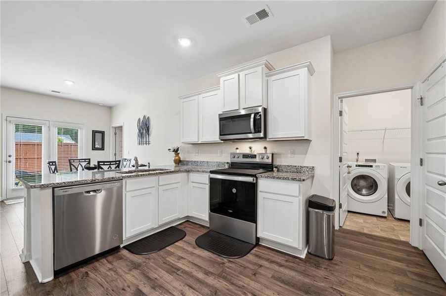 Furnished interior view inside a new home in Champion's Run, Lithonia (Image 10).