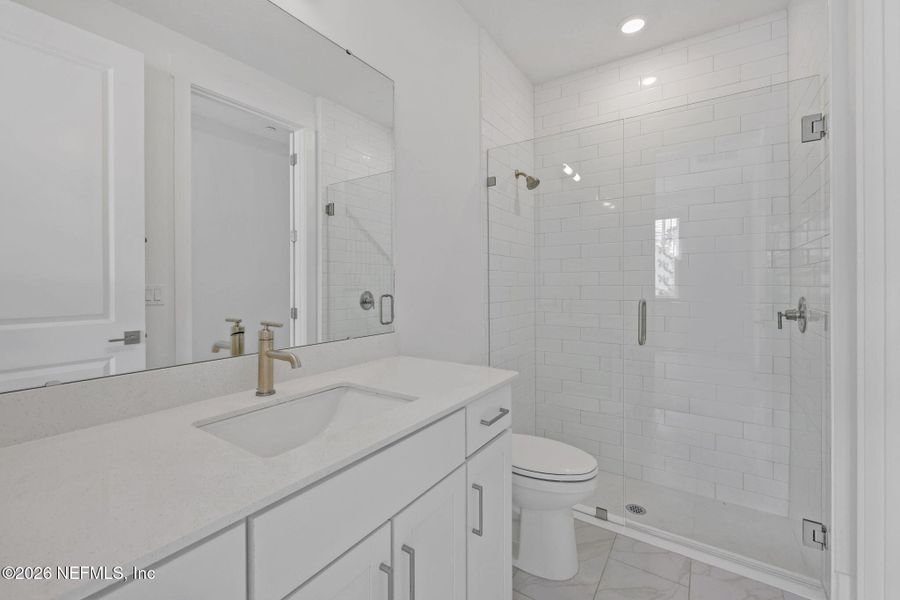 Furnished interior view inside a new home in North Beach Townhomes, Jacksonville Beach (Image 9).