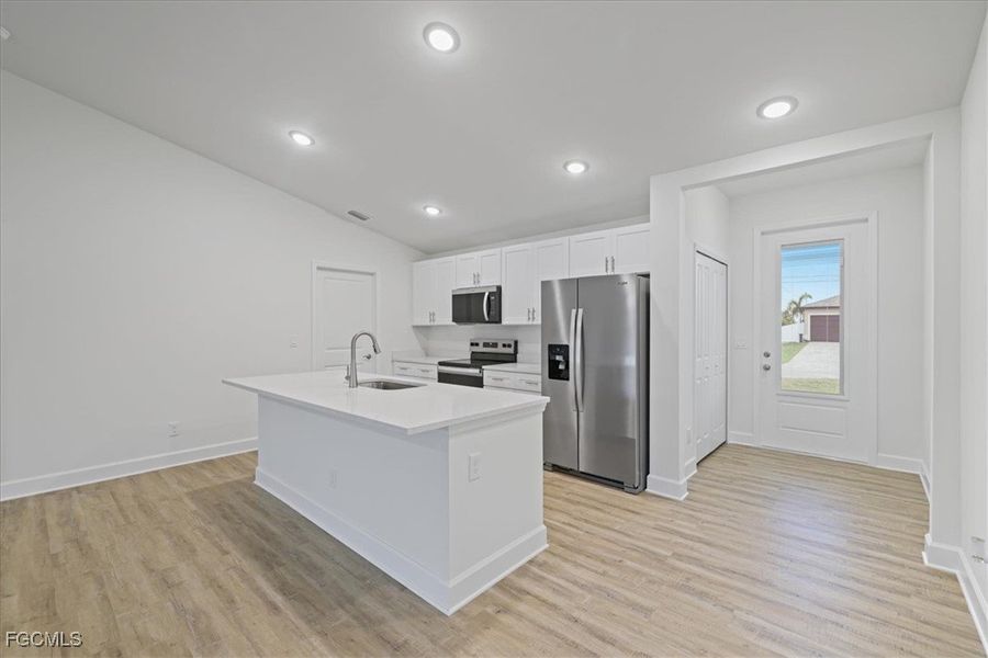 Furnished interior view inside a new home in Cape Coral, Cape Coral (Image 7). Furnished interior view inside a new home in Cape Coral, Cape Coral (Image 7).