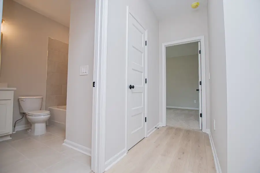 Spacious, unfurnished interior of a new home in WOODMONT RESERVE, Roopville (Image 67).