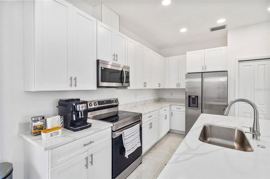 Furnished interior view inside a new home in , Port Charlotte (Image 12).
