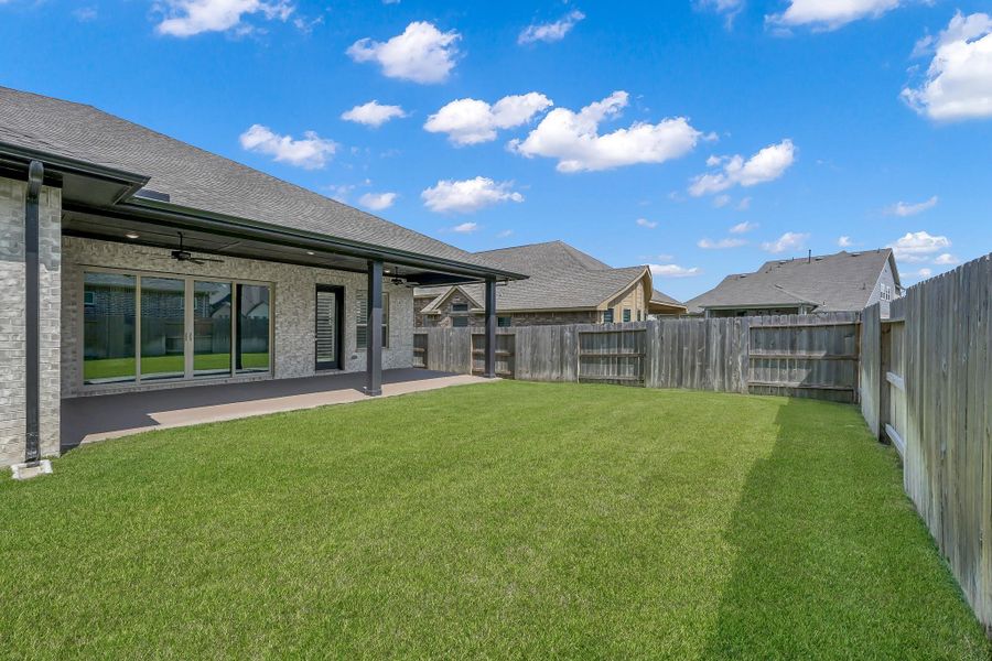 Front exterior of a new home in The Meadows at Imperial Oaks, Conroe, TX, highlighting curb appeal (Image 1). Front exterior of a new home in The Meadows at Imperial Oaks, Conroe, TX, highlighting curb appeal (Image 1).