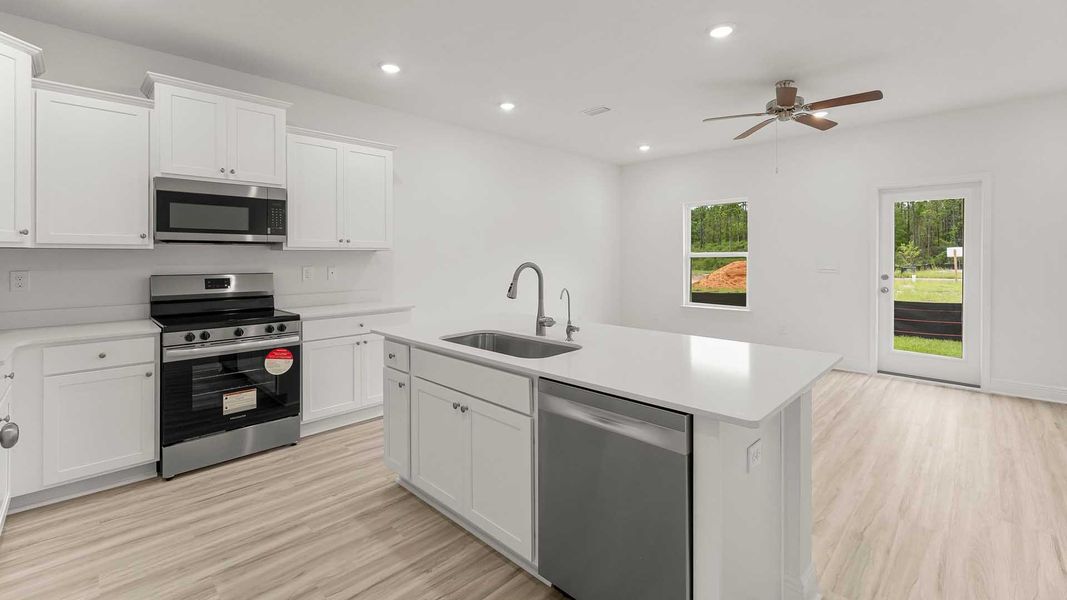 Furnished interior view inside a new home in Palm Street Townhomes, Destin (Image 4).