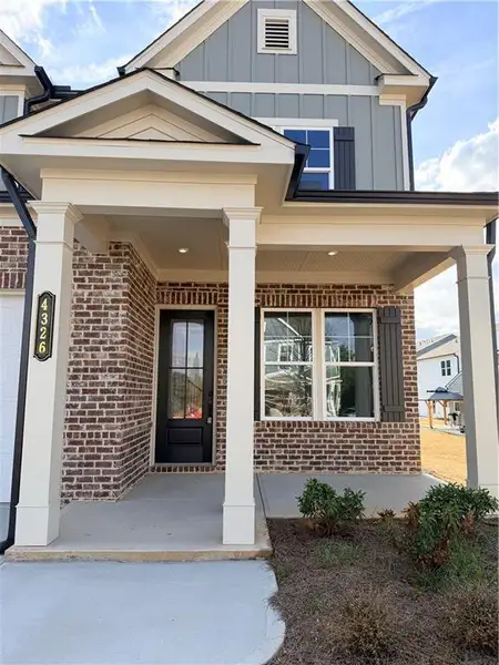 Exterior details and patio area of a home in Annsbury Park, Lilburn (Image 4). Exterior details and patio area of a home in Annsbury Park, Lilburn (Image 4).