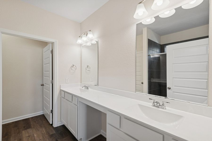 The Crawford- Primary Bath with Dual Vanities. Home under construction, sample photo used for illustrative purposes only, colors and options will vary.