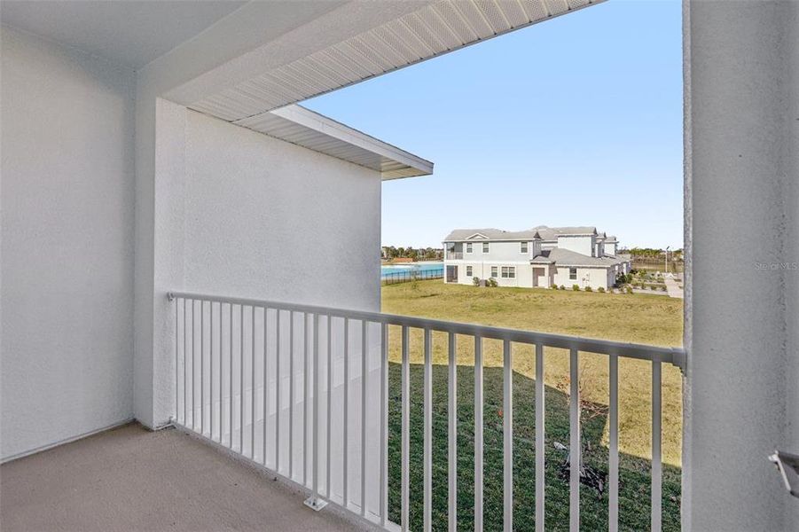Exterior details and patio area of a home in Lagoon Residences at Epperson, Wesley Chapel (Image 25).