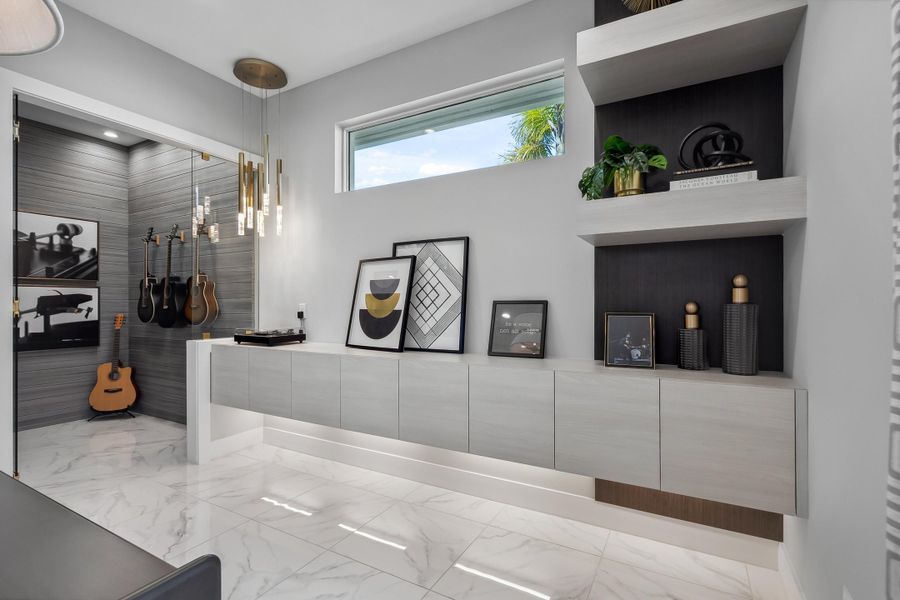 Den | 103 Strand Drive